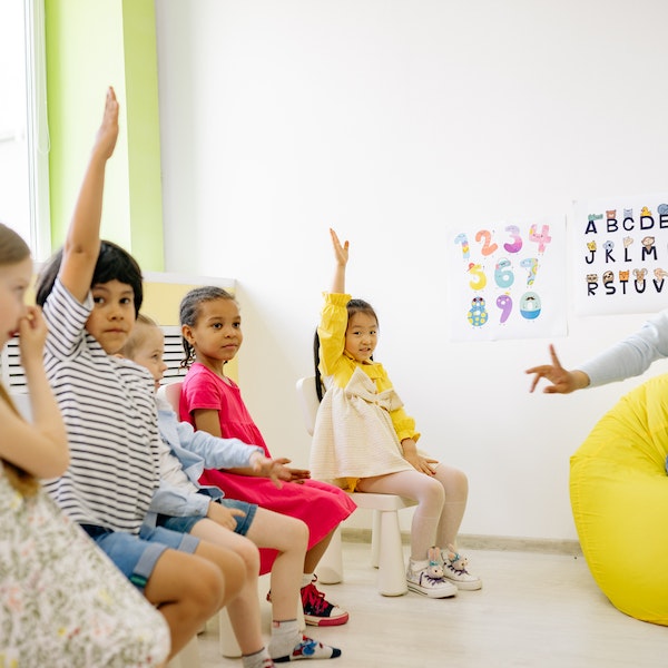 daily morning meeting- students raising their hands