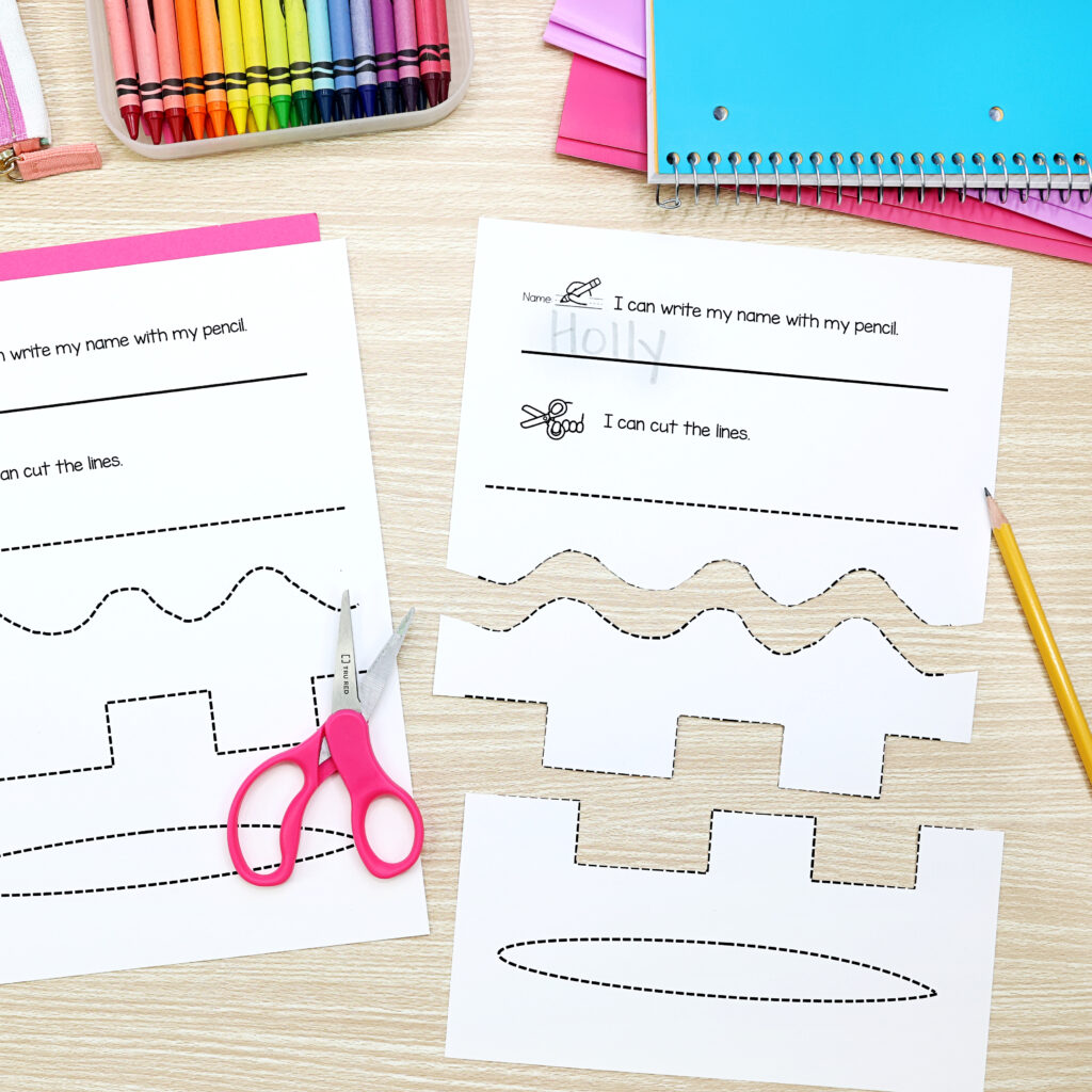 cutting practice worksheet with pink scissors on paper-kindergarten supplies list
